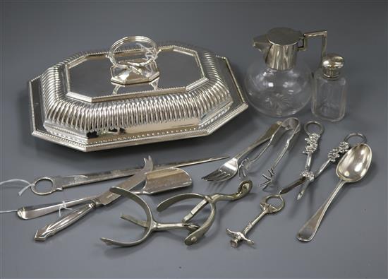 A silver cheese scoop, a plated entree dish and cover and sundry silver and plated items,